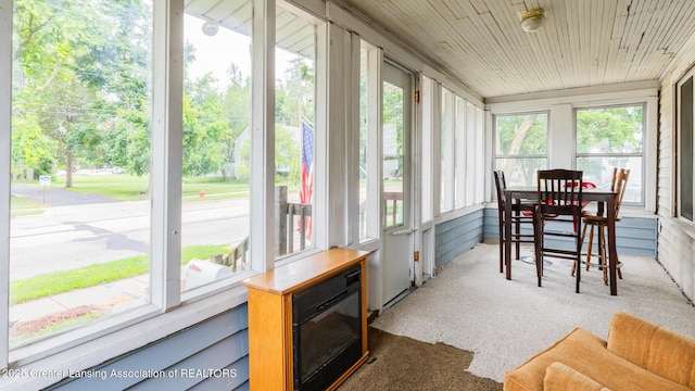 4461 Holt Rd, Holt, MI 48842 - sunroom with plenty of natural light and carpet