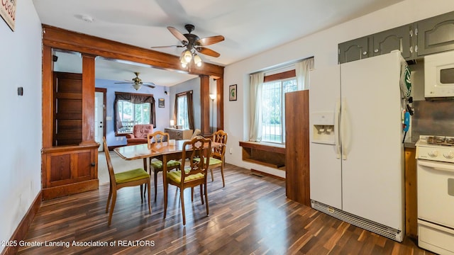 4461 Holt Rd, Holt, MI 48842 - dining area featuring ceiling fan and dark wood-type flooring