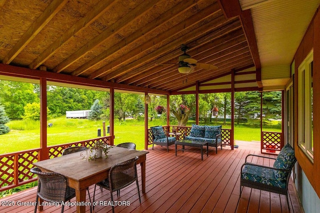 3536 Burkley Rd, Williamston, MI 48895 - wooden terrace featuring ceiling fan, a lawn, outdoor dining space, and outdoor lounge area