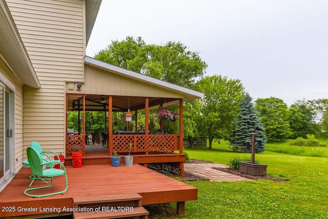 3536 Burkley Rd, Williamston, MI 48895 - wooden terrace with a yard and ceiling fan