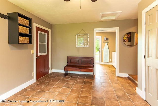 3536 Burkley Rd, Williamston, MI 48895 - tiled entrance foyer featuring baseboards and ceiling fan