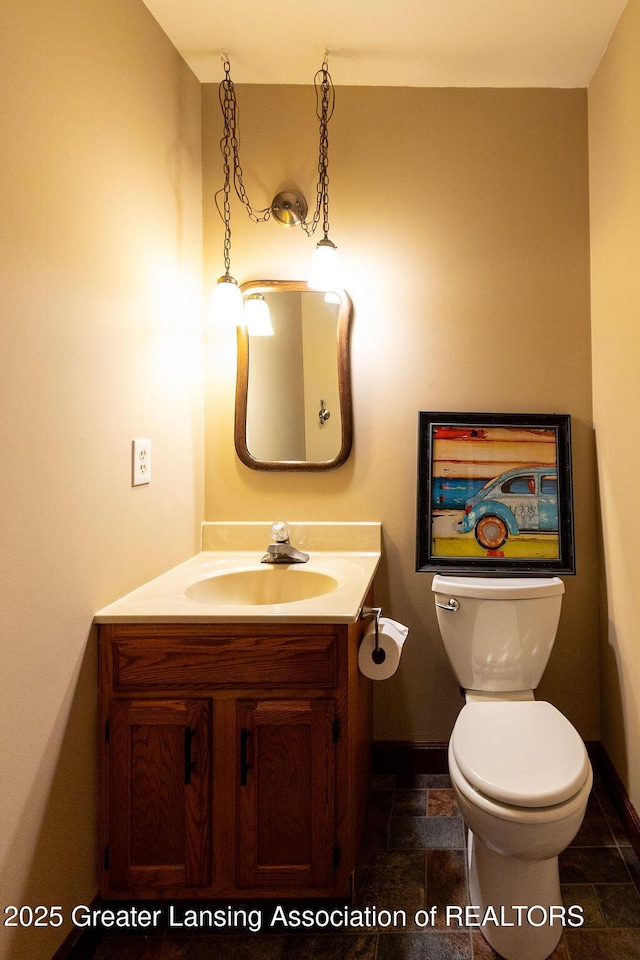 3536 Burkley Rd, Williamston, MI 48895 - bathroom featuring vanity and stone tile flooring