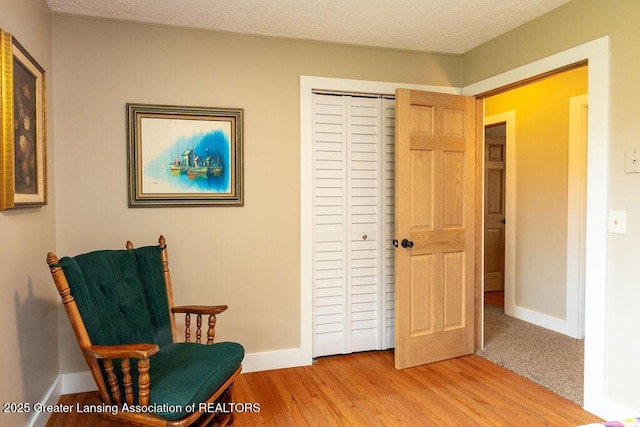 3536 Burkley Rd, Williamston, MI 48895 - living area featuring baseboards and wood finished floors