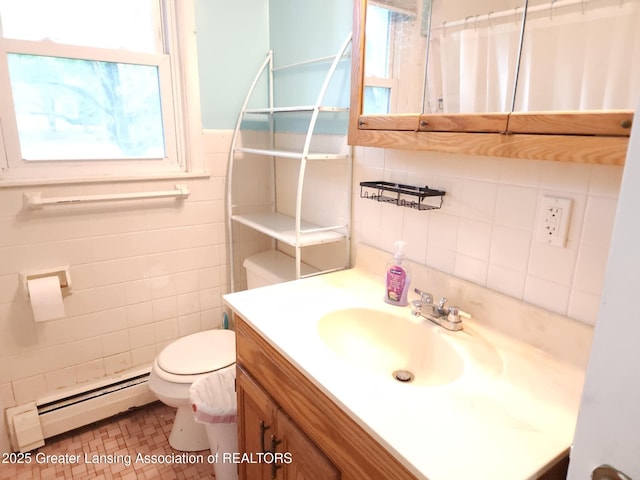 3612 Dell Rd, Holt, MI 48842 - bathroom featuring a baseboard radiator, tile walls, vanity, and curtained shower