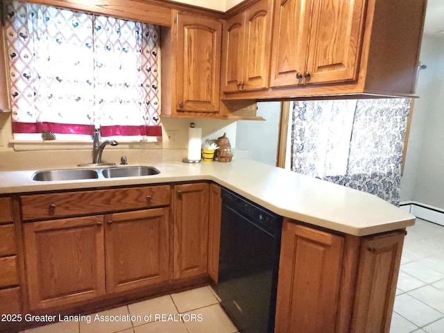 3612 Dell Rd, Holt, MI 48842 - kitchen with dishwasher, light tile patterned floors, brown cabinetry, and light countertops