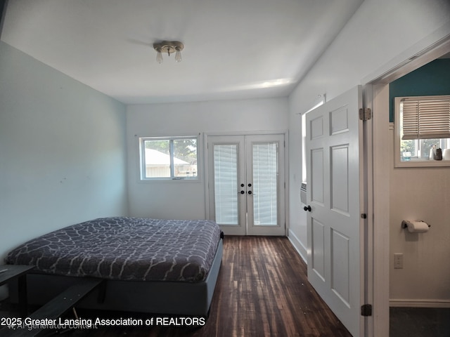412 N Hickory St, Owosso, MI 48867 - bedroom featuring french doors, dark wood-type flooring, and access to exterior