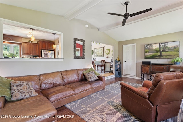 7050 E Eaton Hwy, Sunfield, MI 48890 - living area featuring dark wood-style floors and a ceiling fan