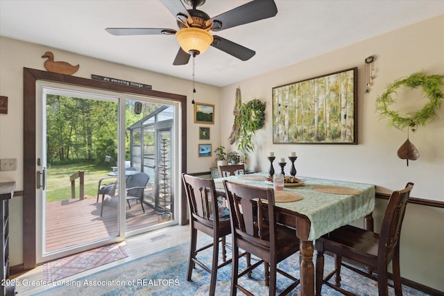 7050 E Eaton Hwy, Sunfield, MI 48890 - dining area with a ceiling fan