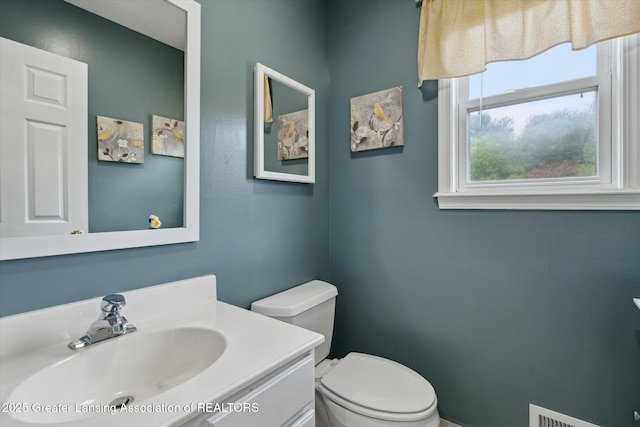 129 Elizabeth Way, Potterville, MI 48876 - half bathroom with toilet and vanity