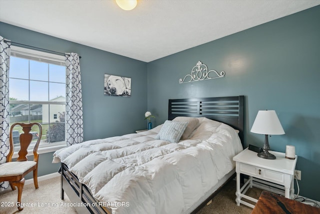 129 Elizabeth Way, Potterville, MI 48876 - bedroom featuring carpet flooring and multiple windows