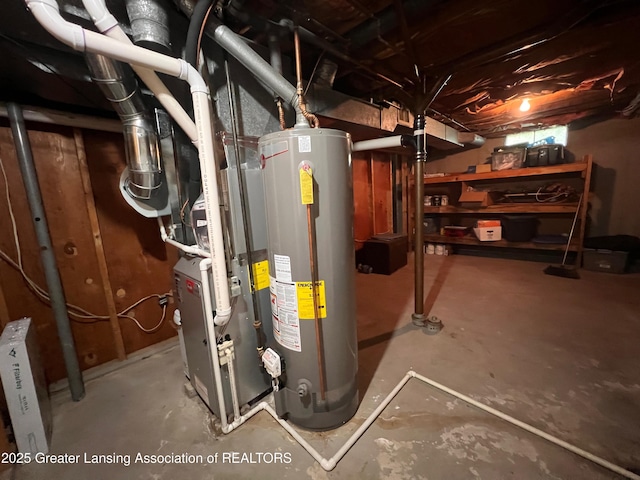 709 N Mead St, Saint Johns, MI 48879 - utility room with water heater