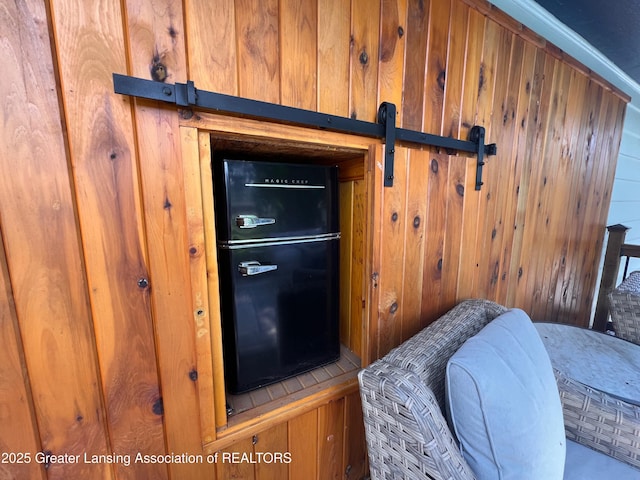 709 N Mead St, Saint Johns, MI 48879 - detailed view of wooden walls and a barn door