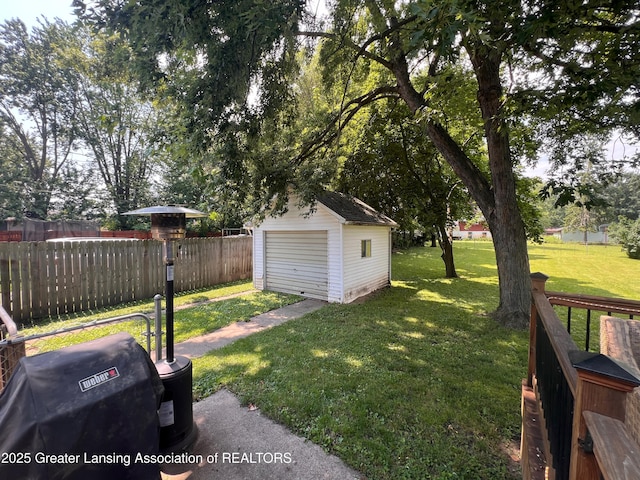 709 N Mead St, Saint Johns, MI 48879 - view of yard featuring a storage unit