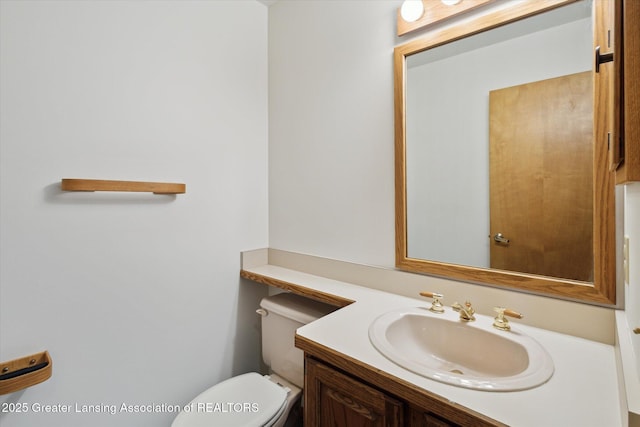 2575 Capeside Dr, Okemos, MI 48864 - bathroom with vanity and toilet
