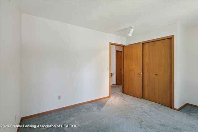 2575 Capeside Dr, Okemos, MI 48864 - unfurnished bedroom with carpet floors and a closet