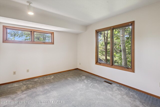 2575 Capeside Dr, Okemos, MI 48864 - empty room featuring baseboards and carpet flooring