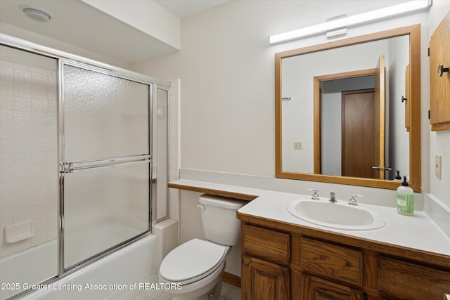 2575 Capeside Dr, Okemos, MI 48864 - bathroom featuring vanity and combined bath / shower with glass door