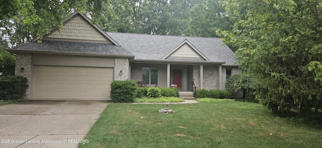 1649 Roxburgh Ave, East Lansing, MI 48823 - view of front facade featuring an attached garage, driveway, a shingled roof, and a front lawn