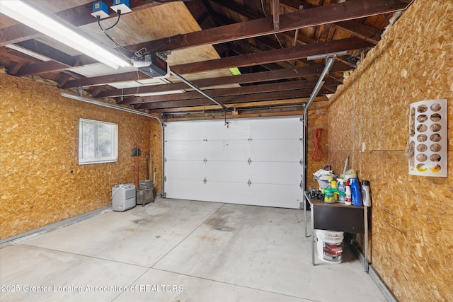873 Union Ave, Owosso, MI 48867 - garage featuring a garage door opener