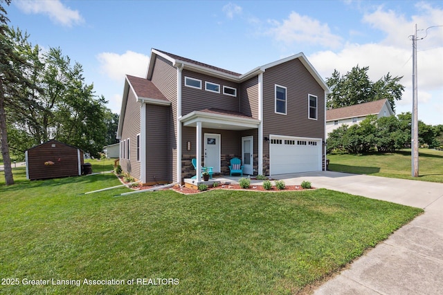 112 E Barber St, Ithaca, MI 48847 - traditional home with an attached garage, concrete driveway, and a front lawn