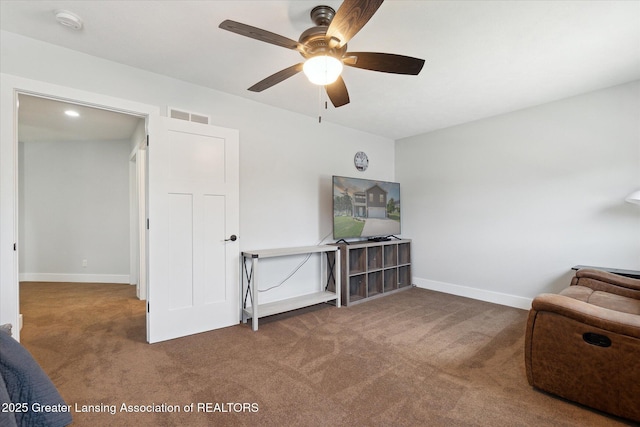 112 E Barber St, Ithaca, MI 48847 - sitting room with carpet and ceiling fan