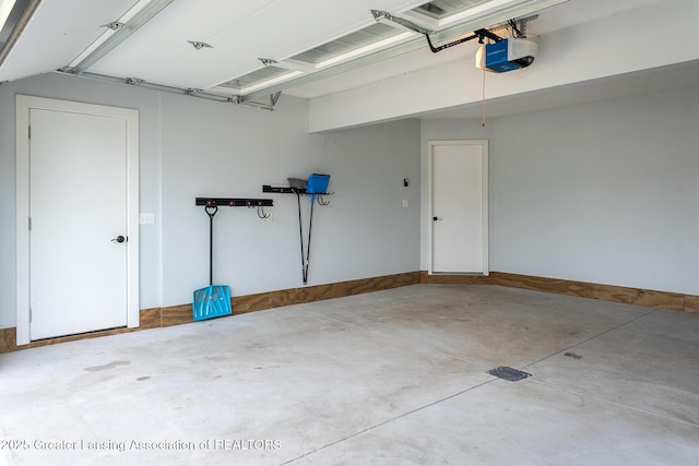 112 E Barber St, Ithaca, MI 48847 - garage with a garage door opener