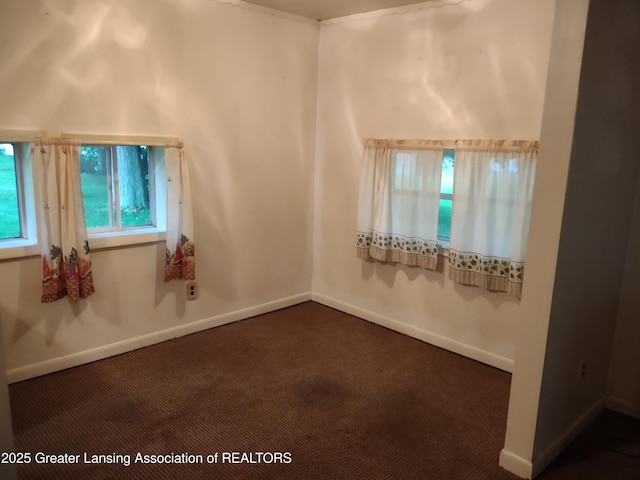 518 Clark St, Eaton Rapids, MI 48827 - unfurnished room with dark colored carpet