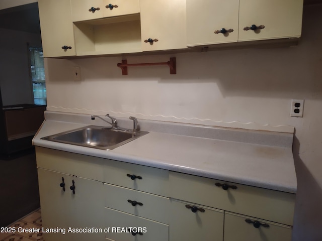 518 Clark St, Eaton Rapids, MI 48827 - kitchen with light countertops, open shelves, and white cabinets