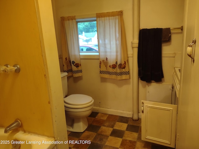 518 Clark St, Eaton Rapids, MI 48827 - bathroom featuring tile patterned floors and toilet