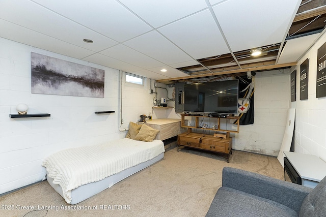 720 Linden St, East Lansing, MI 48823 - bedroom featuring carpet floors and concrete block wall