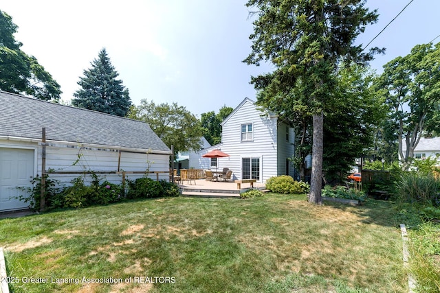 720 Linden St, East Lansing, MI 48823 - view of green lawn with a deck