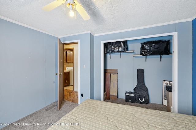 9428 S Wright Rd, Eagle, MI 48822 - carpeted bedroom featuring washer / clothes dryer, ceiling fan, crown molding, and a textured ceiling