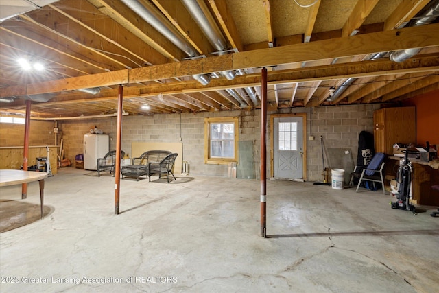 9428 S Wright Rd, Eagle, MI 48822 - basement with washer / clothes dryer