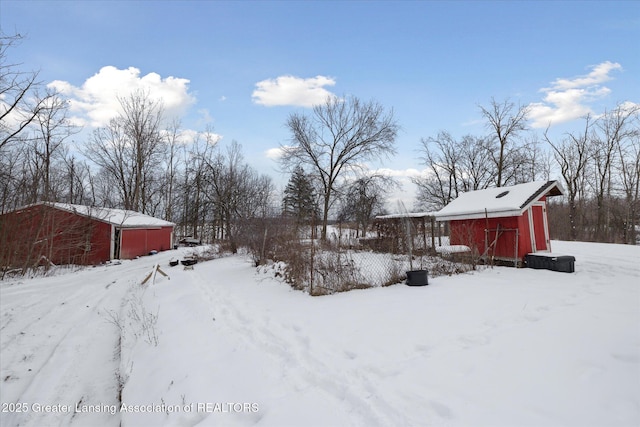 9428 S Wright Rd, Eagle, MI 48822 - yard covered in snow with an outbuilding