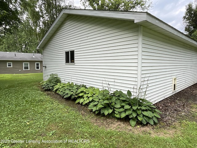 315 Oyer St, Springport, MI 49284 - view of side of home featuring a lawn