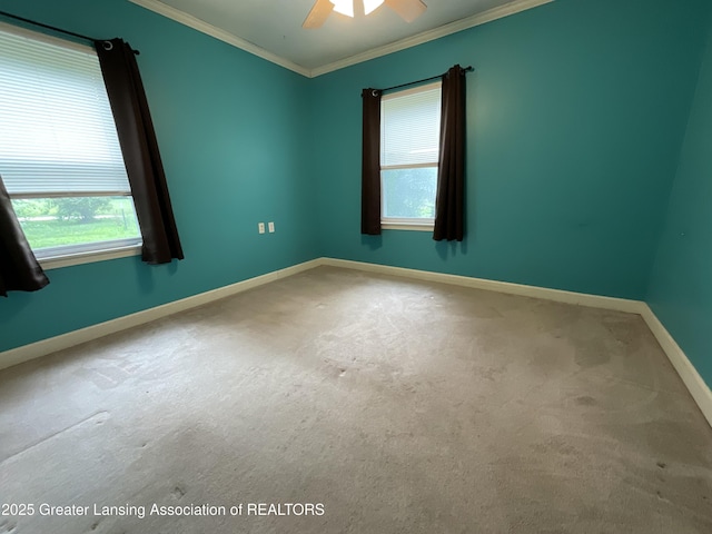 315 Oyer St, Springport, MI 49284 - carpeted spare room with ornamental molding, plenty of natural light, and a ceiling fan