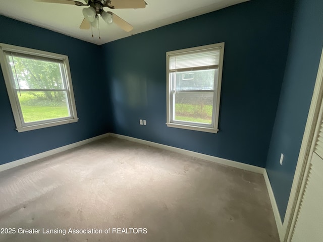 315 Oyer St, Springport, MI 49284 - spare room featuring a ceiling fan and carpet flooring