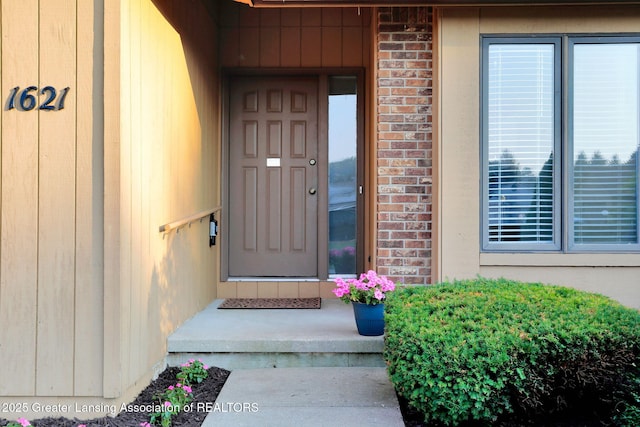 1621 Willow Creek Dr, Lansing, MI 48917 - view of exterior entry with brick siding
