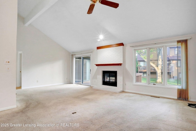 1621 Willow Creek Dr, Lansing, MI 48917 - unfurnished living room with carpet floors, ceiling fan, a brick fireplace, and recessed lighting