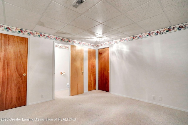1621 Willow Creek Dr, Lansing, MI 48917 - unfurnished bedroom featuring carpet and a drop ceiling