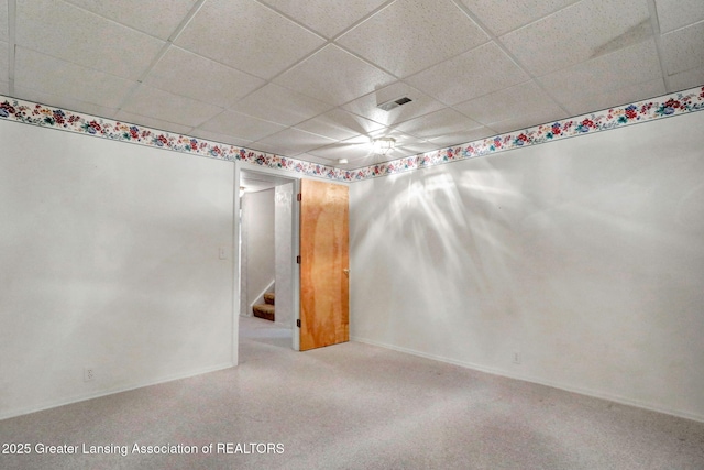 1621 Willow Creek Dr, Lansing, MI 48917 - finished basement with a paneled ceiling, stairway, and carpet