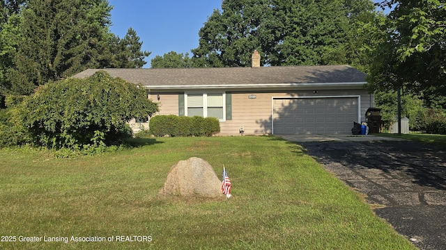13160 Shadybrook Ln, Dewitt, MI 48820 - ranch-style home featuring a garage, asphalt driveway, a front yard, a chimney, and roof with shingles