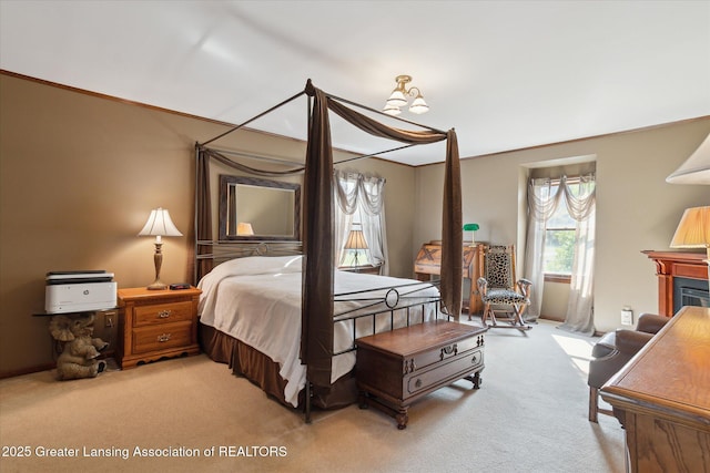 9303 Blueberry Ct, Howell, MI 48843 - bedroom featuring carpet floors, multiple windows, and ornamental molding
