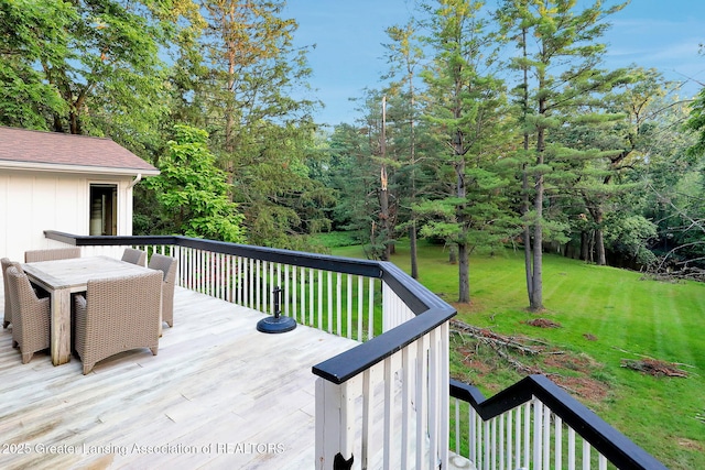 2315 Hamilton Rd, Okemos, MI 48864 - wooden deck featuring a yard and outdoor dining area