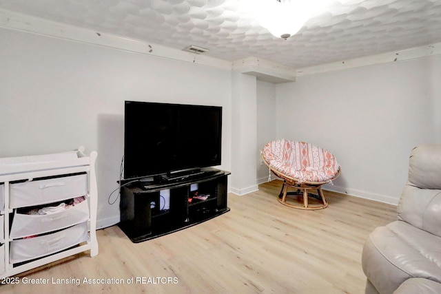 2315 Hamilton Rd, Okemos, MI 48864 - living area with wood finished floors and baseboards