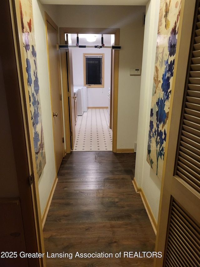 2315 Hamilton Rd, Okemos, MI 48864 - hall with independent washer and dryer and wood finished floors