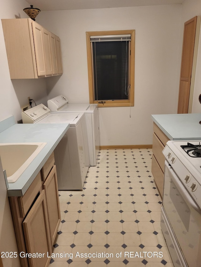 2315 Hamilton Rd, Okemos, MI 48864 - laundry room with light floors and separate washer and dryer