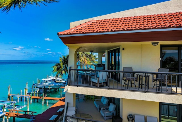 view of dock featuring a water view and boat lift