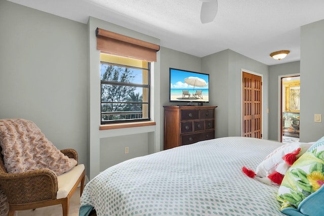 bedroom featuring ceiling fan
