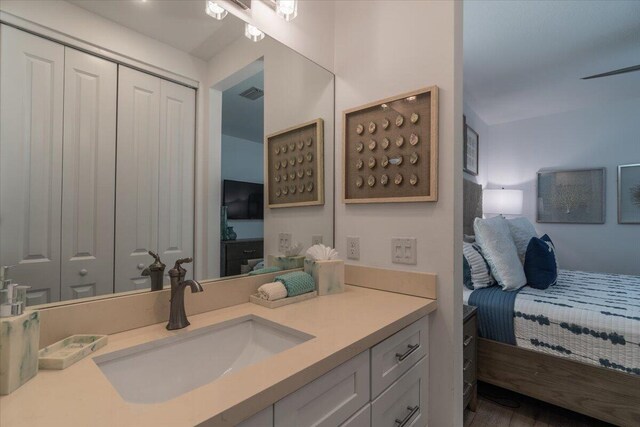 bathroom featuring visible vents and vanity